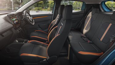 ergo smart cabin with sporty orange & white seat upholstery and striped embossing